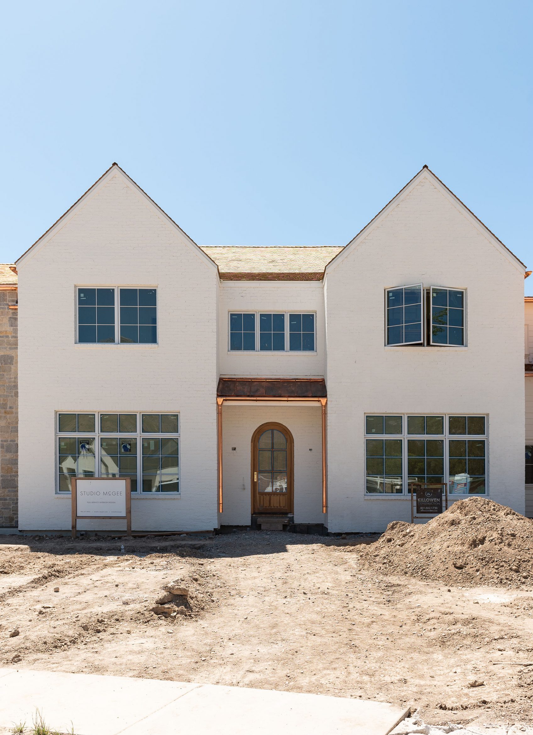 White exterior home in construction phase