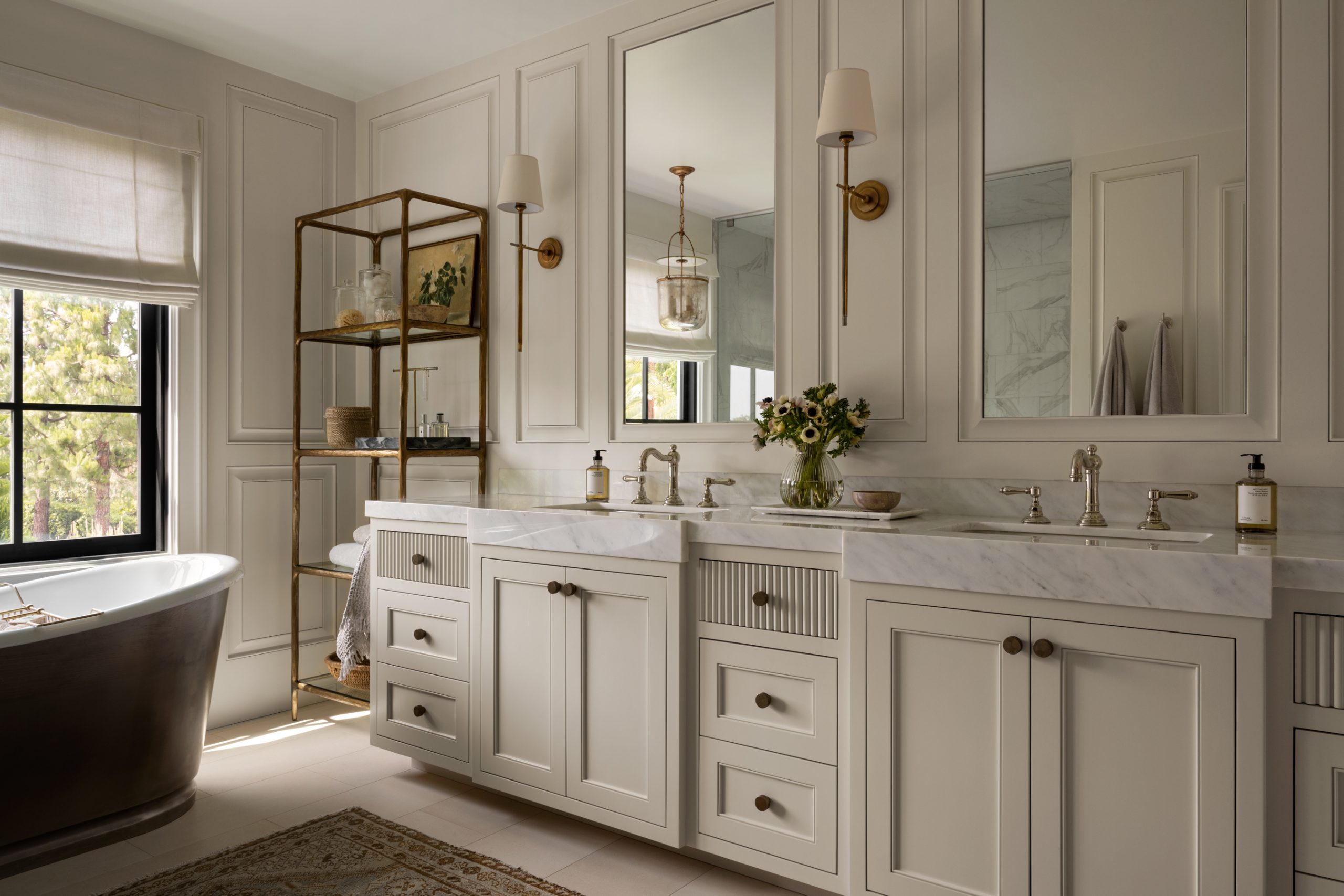 bathroom with cream cabinets and marble counter top