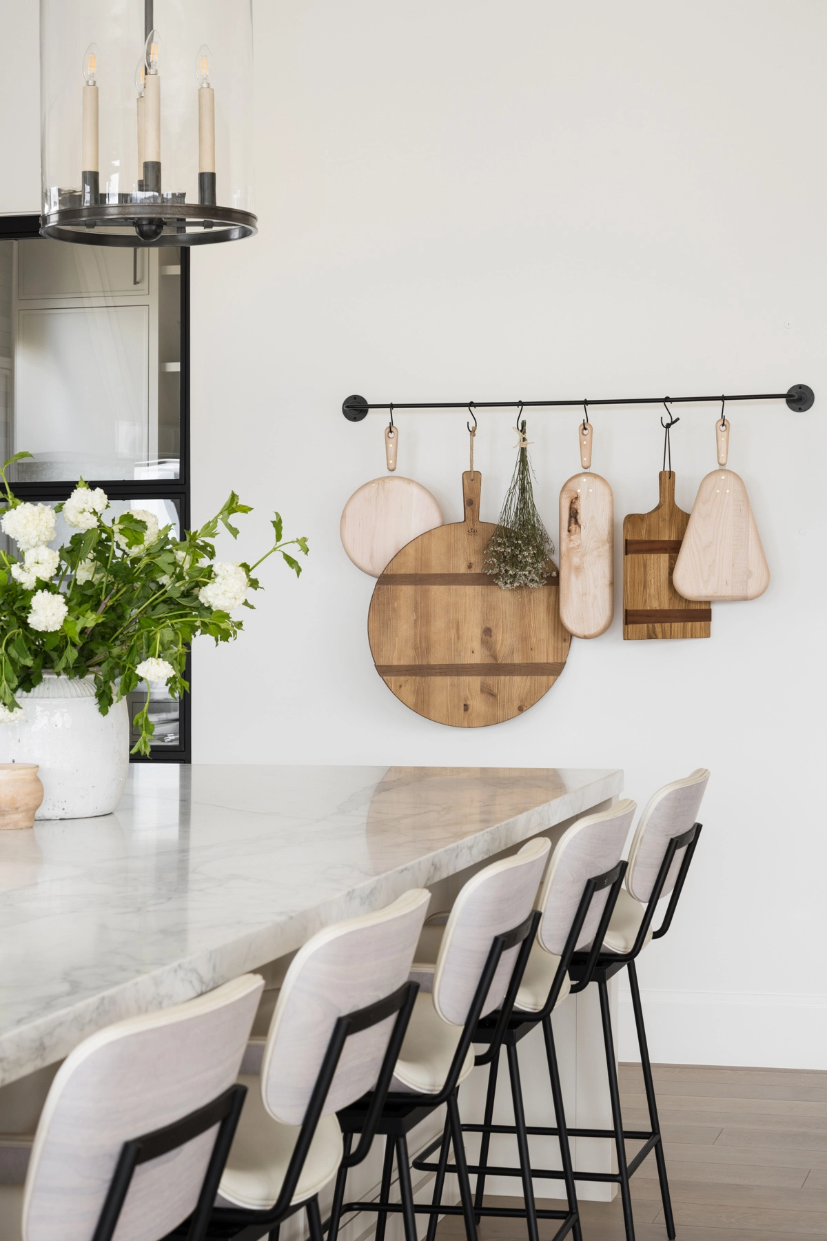 cutting board hanging rack in kitchen