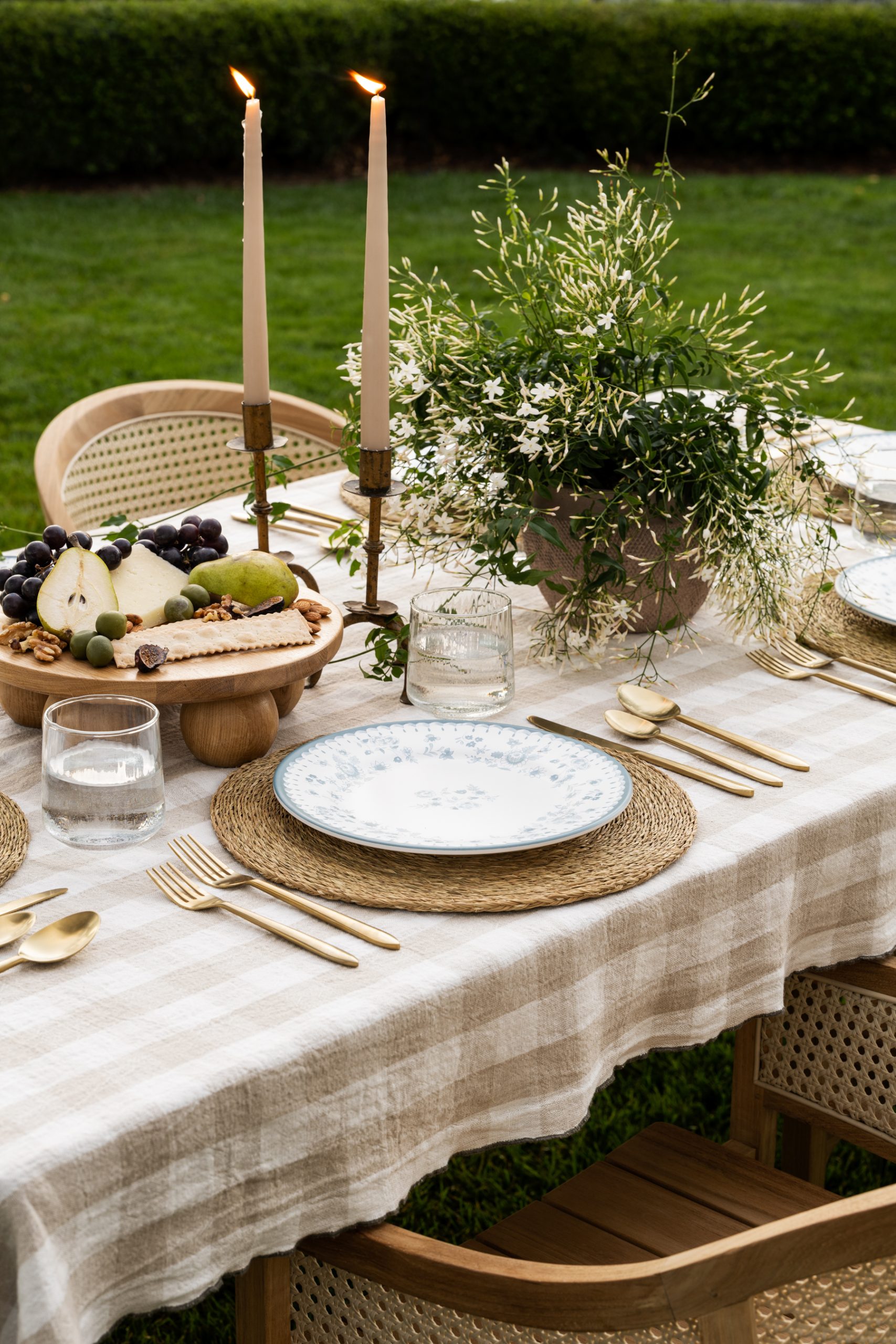 tablescape with gingham tablecloth and blue melamine plates