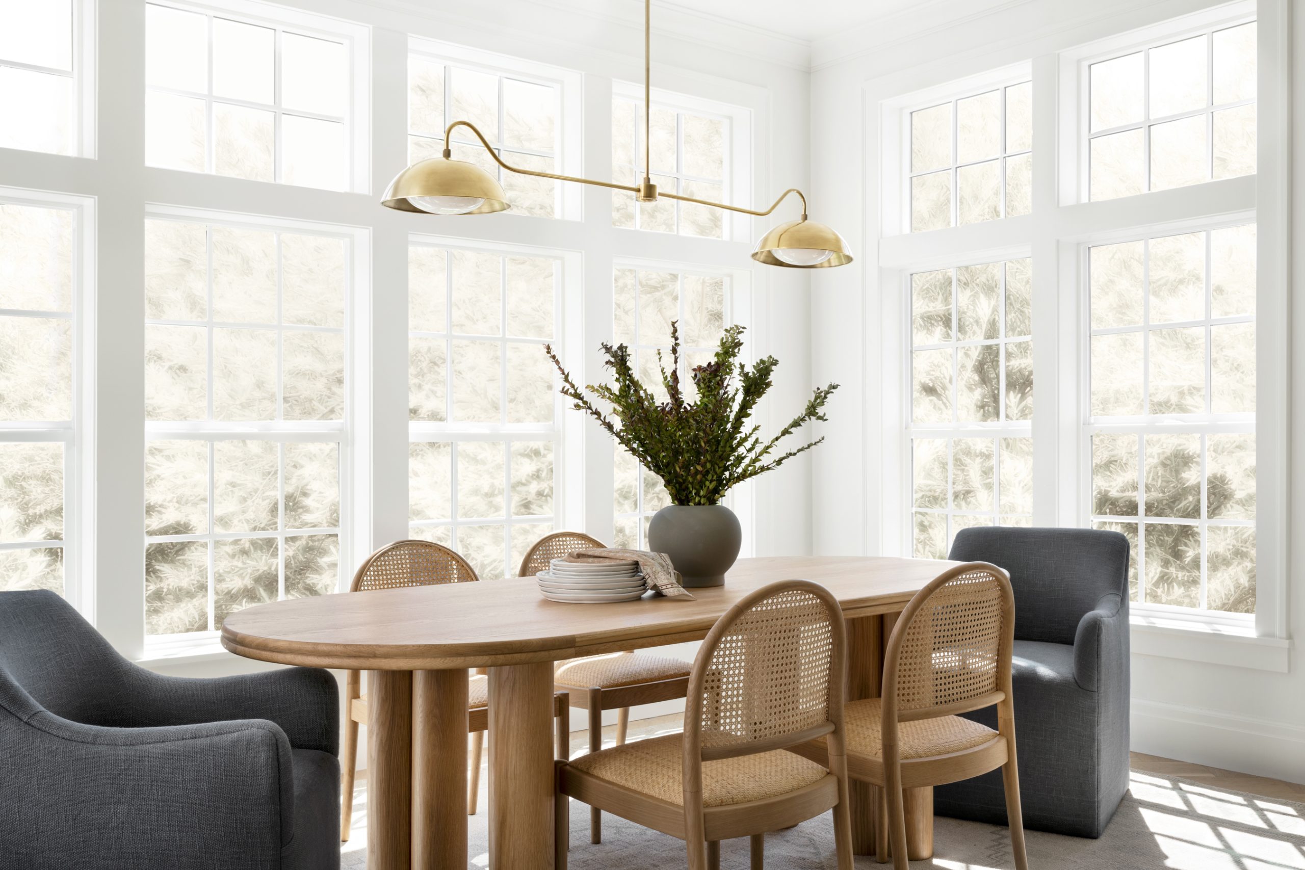 wood table with upholstered and wooded dining chairs