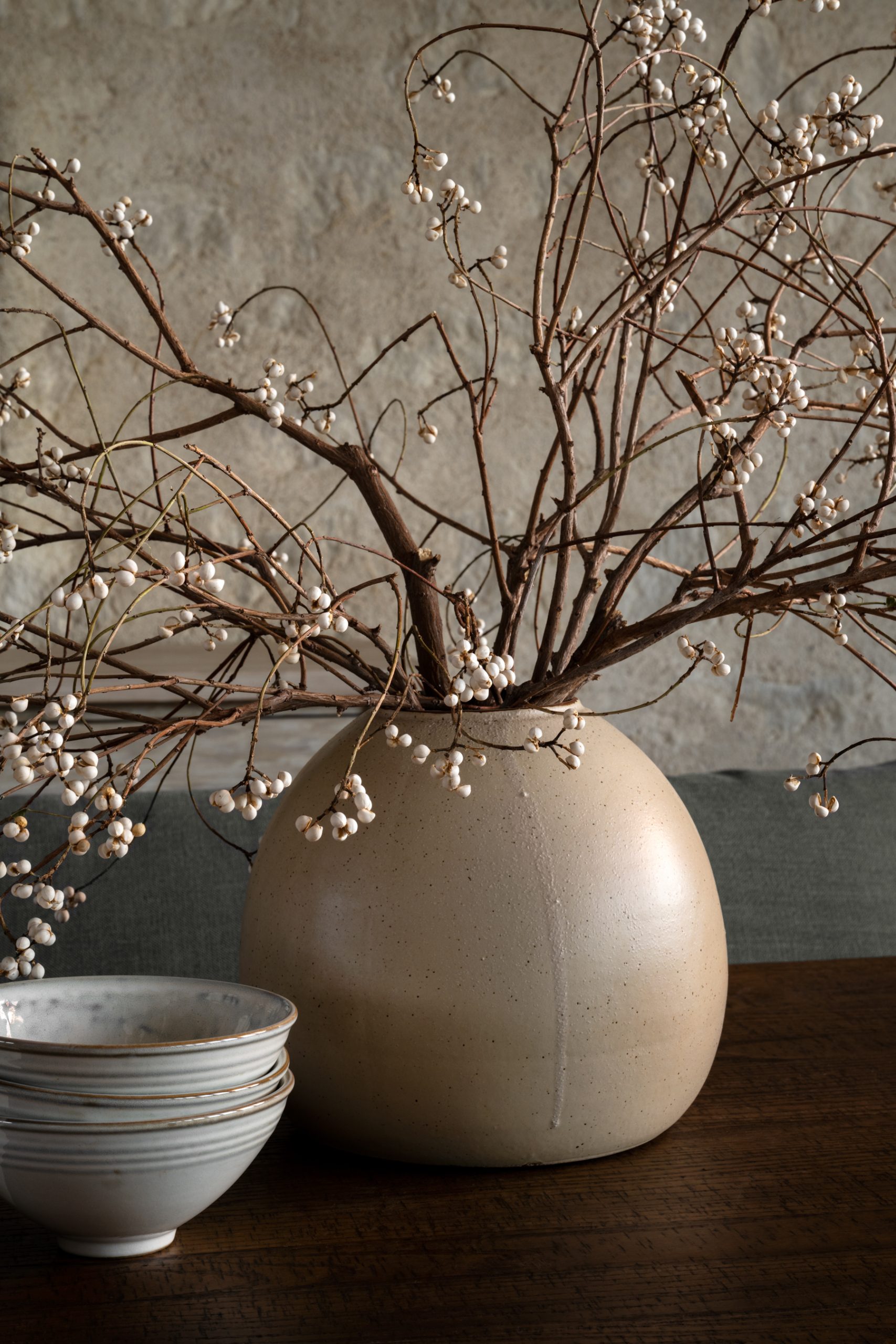 Branches in vase styled on dining table