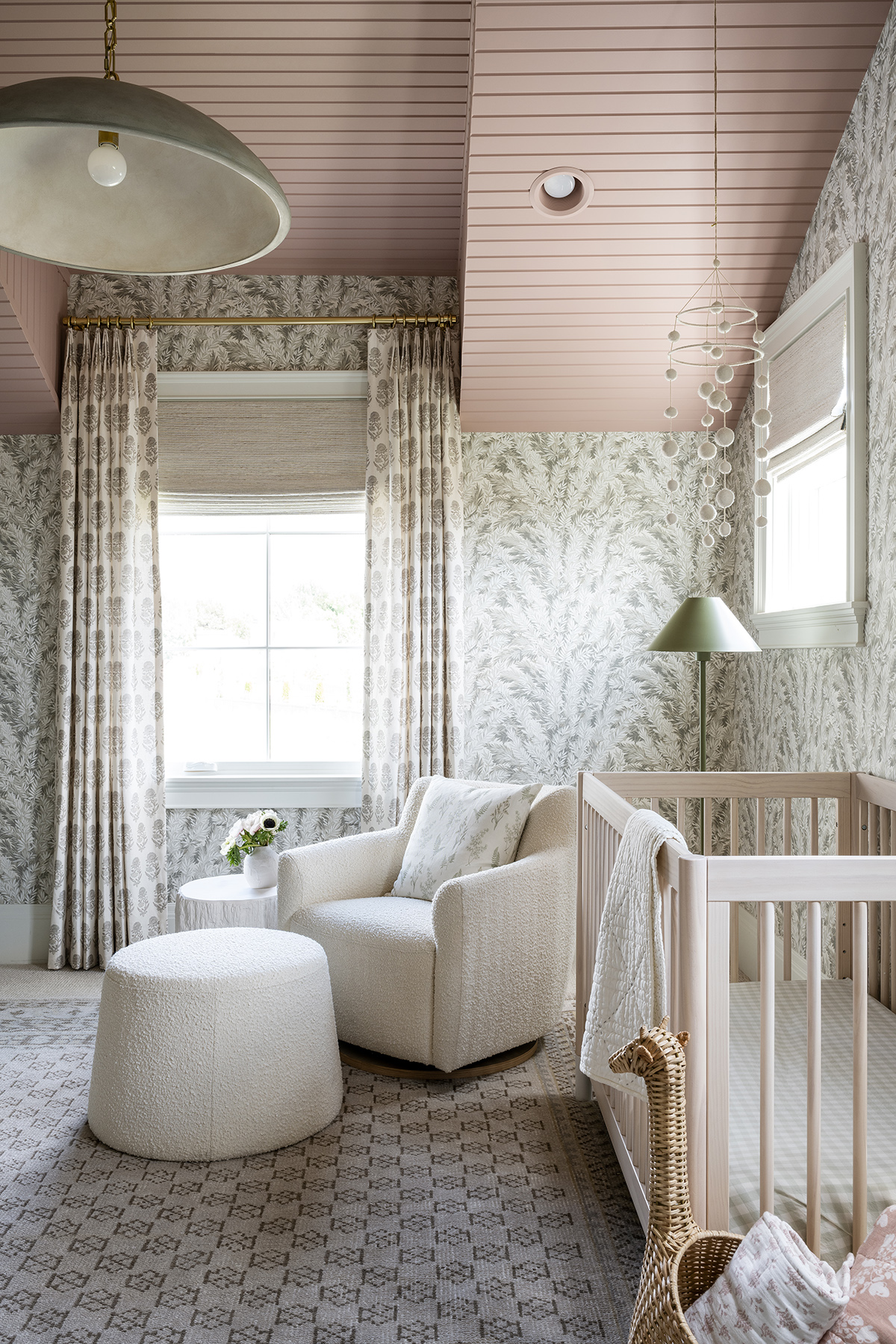 nursery with patterned wallpaper