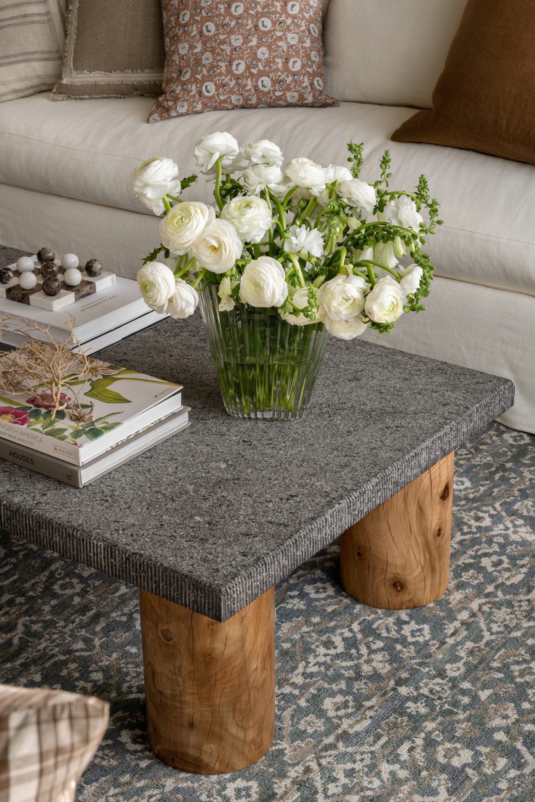 coffee table with granite top and wooden legs