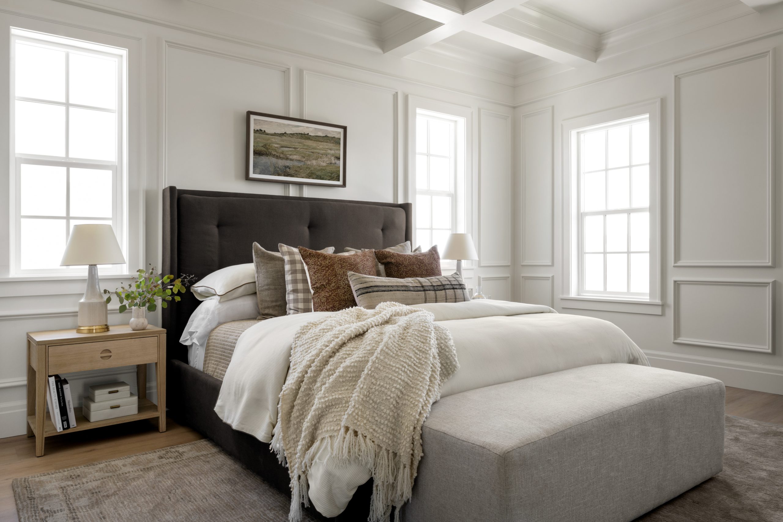 gray bed frame with wood nightstands