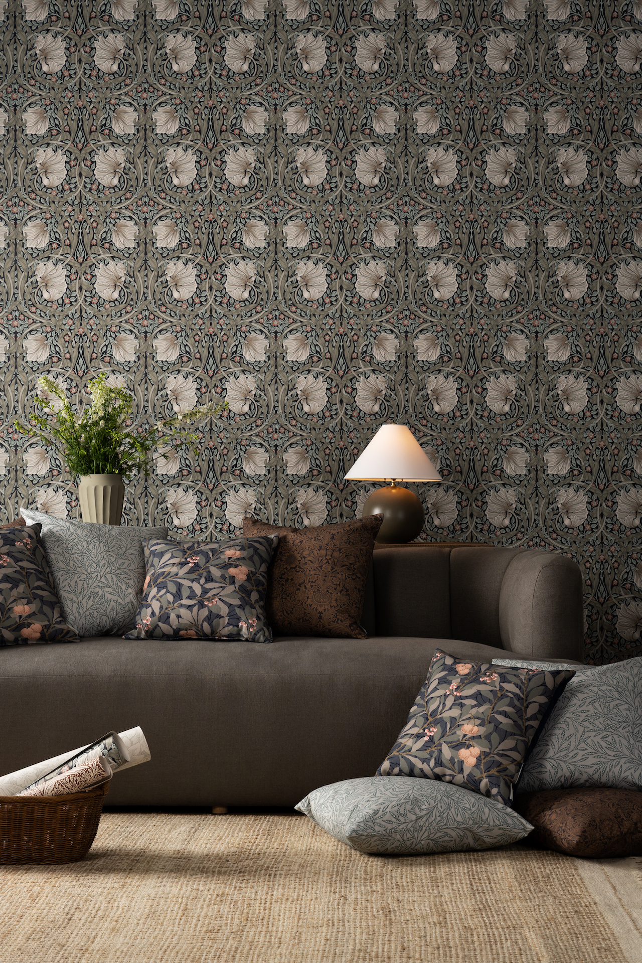 Sofa with floral wallpaper in the background