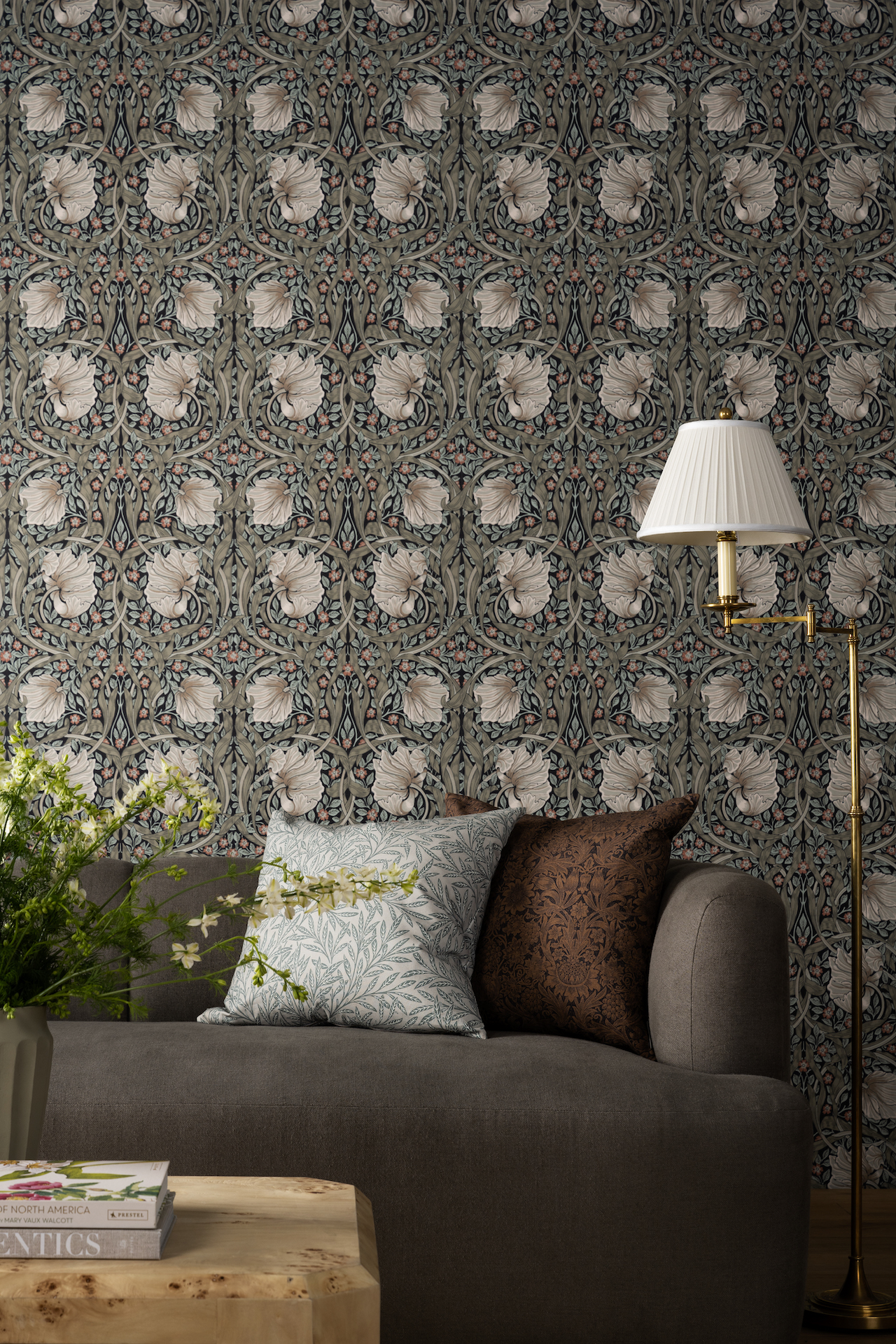 floral wallpaper with sofa and lamp