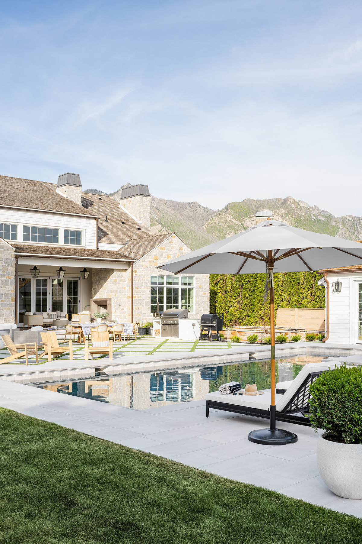 backyard with pool, grill, and outdoor furniture