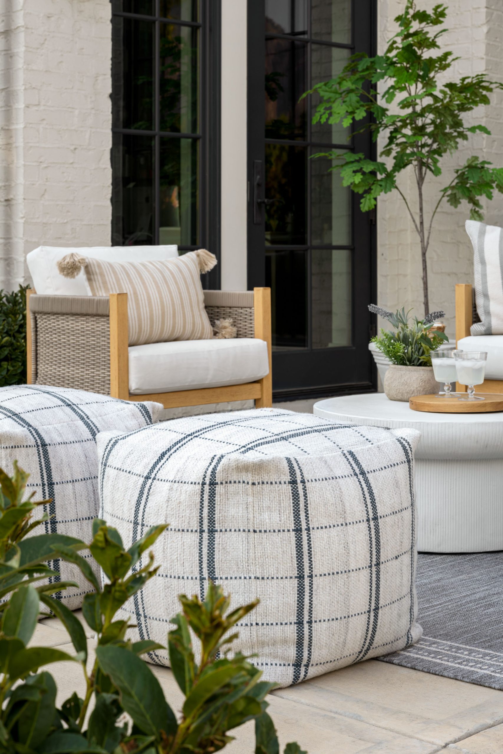 Patterned ottomans in outdoor living area