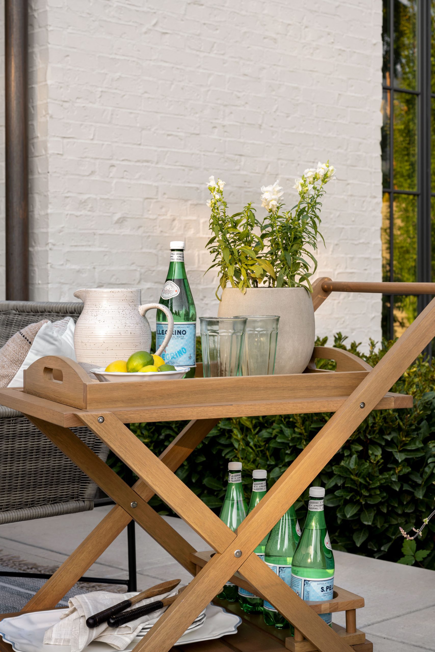 Outdoor wood cart with drinks and planter