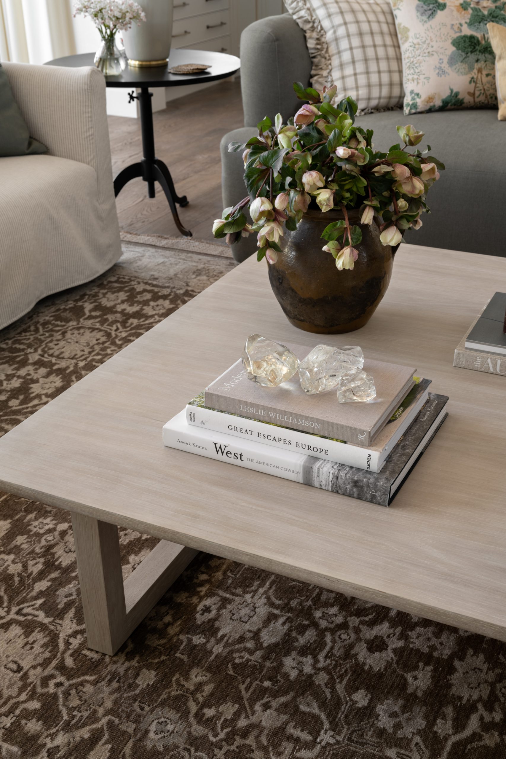 florals in vase on coffee table in living room
