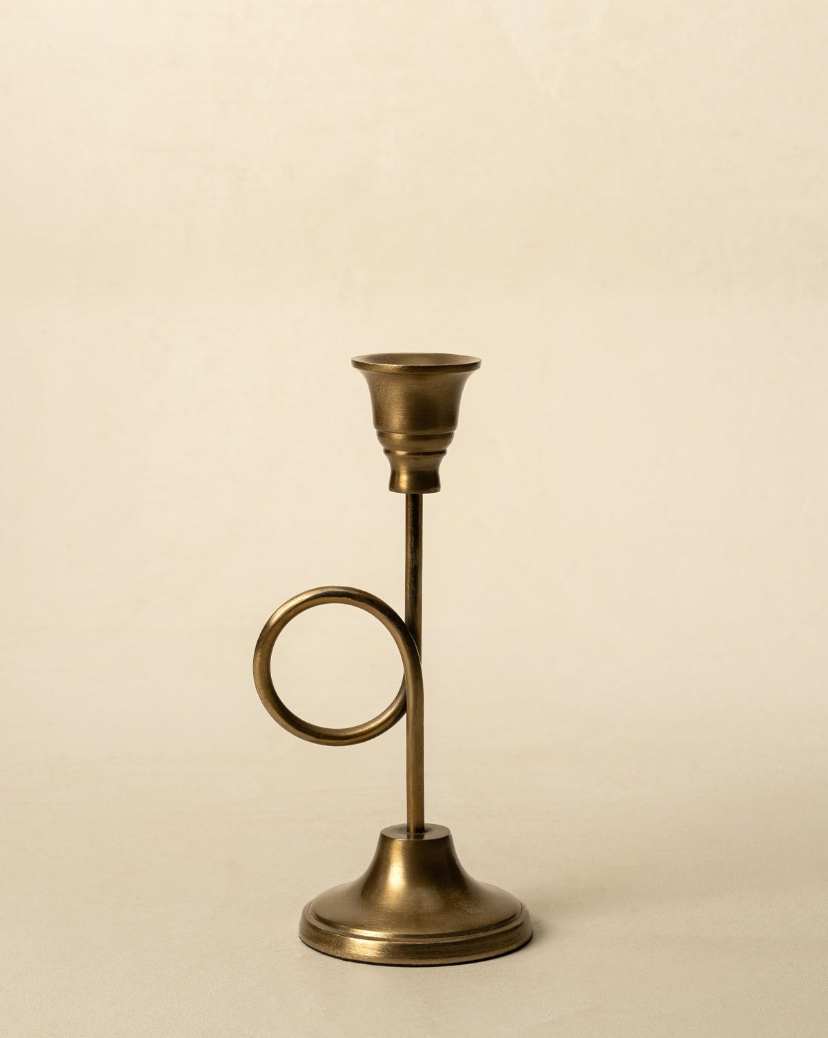 Decorate your dining table with a the antique-finished French horn candle holder from Studio McGee.
