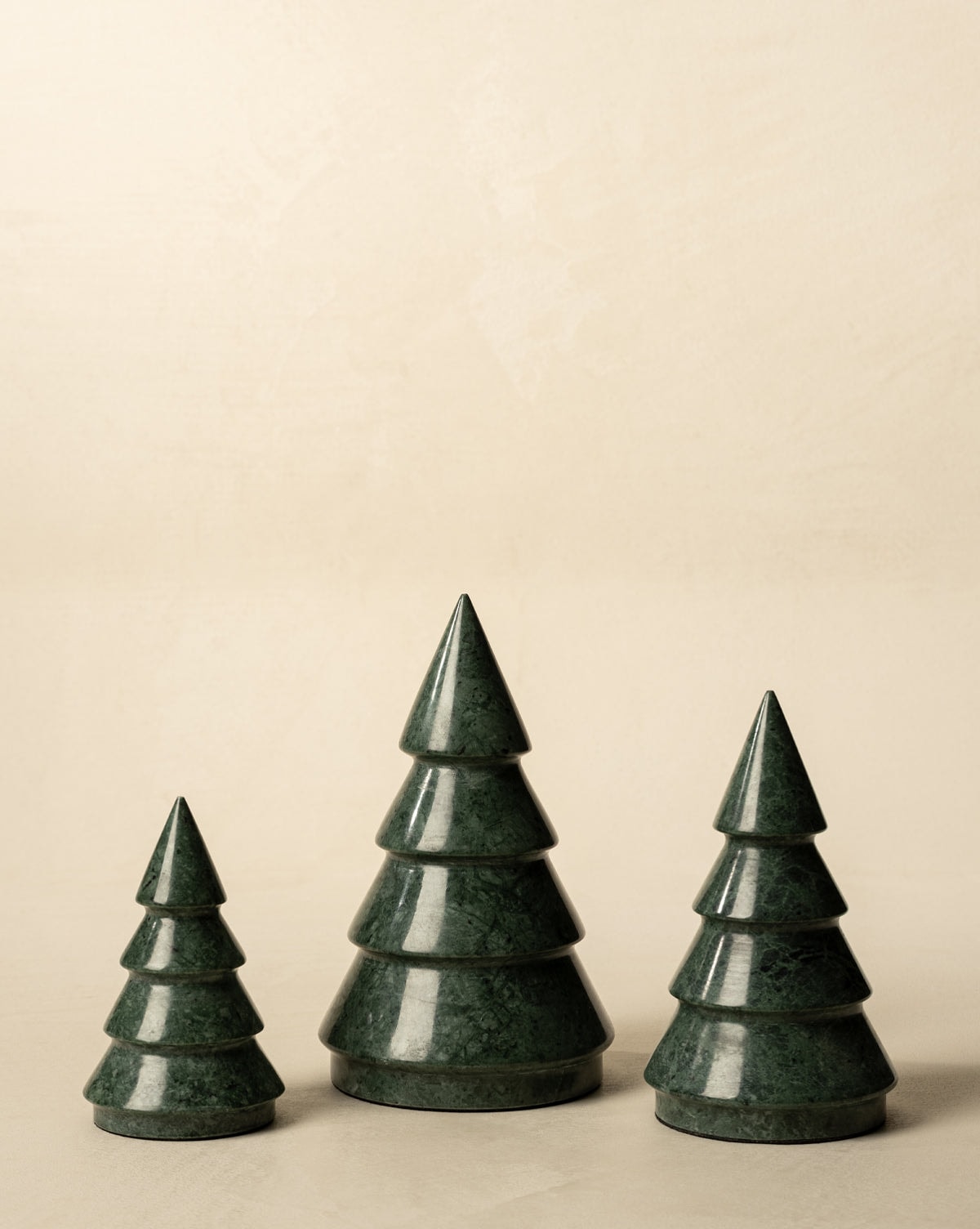 Set of 3 small green marble Christmas trees to adorn holiday tabletops or mantles from Studio McGee.