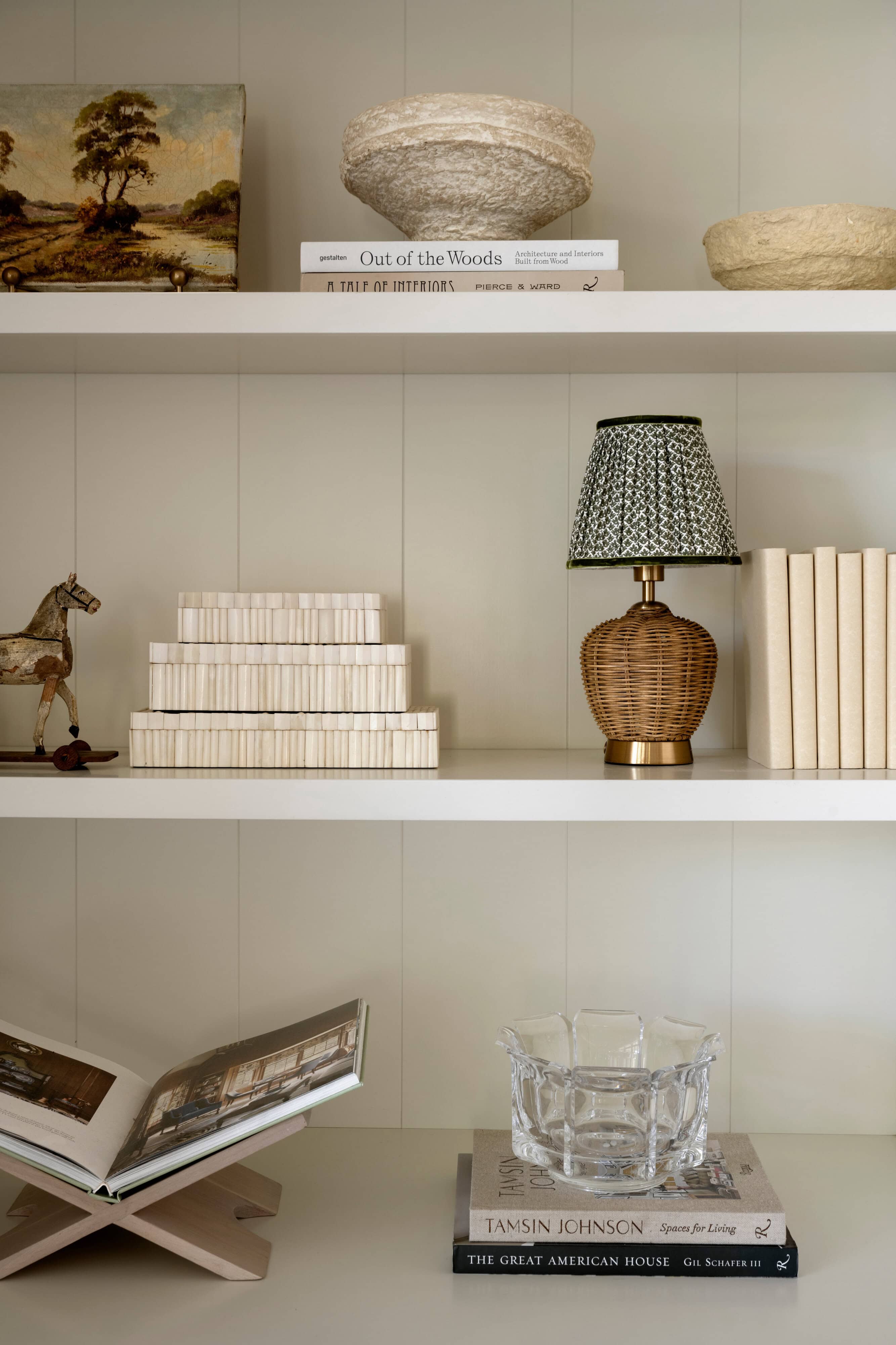 A white shelves with objects on it, by McGee & Co.