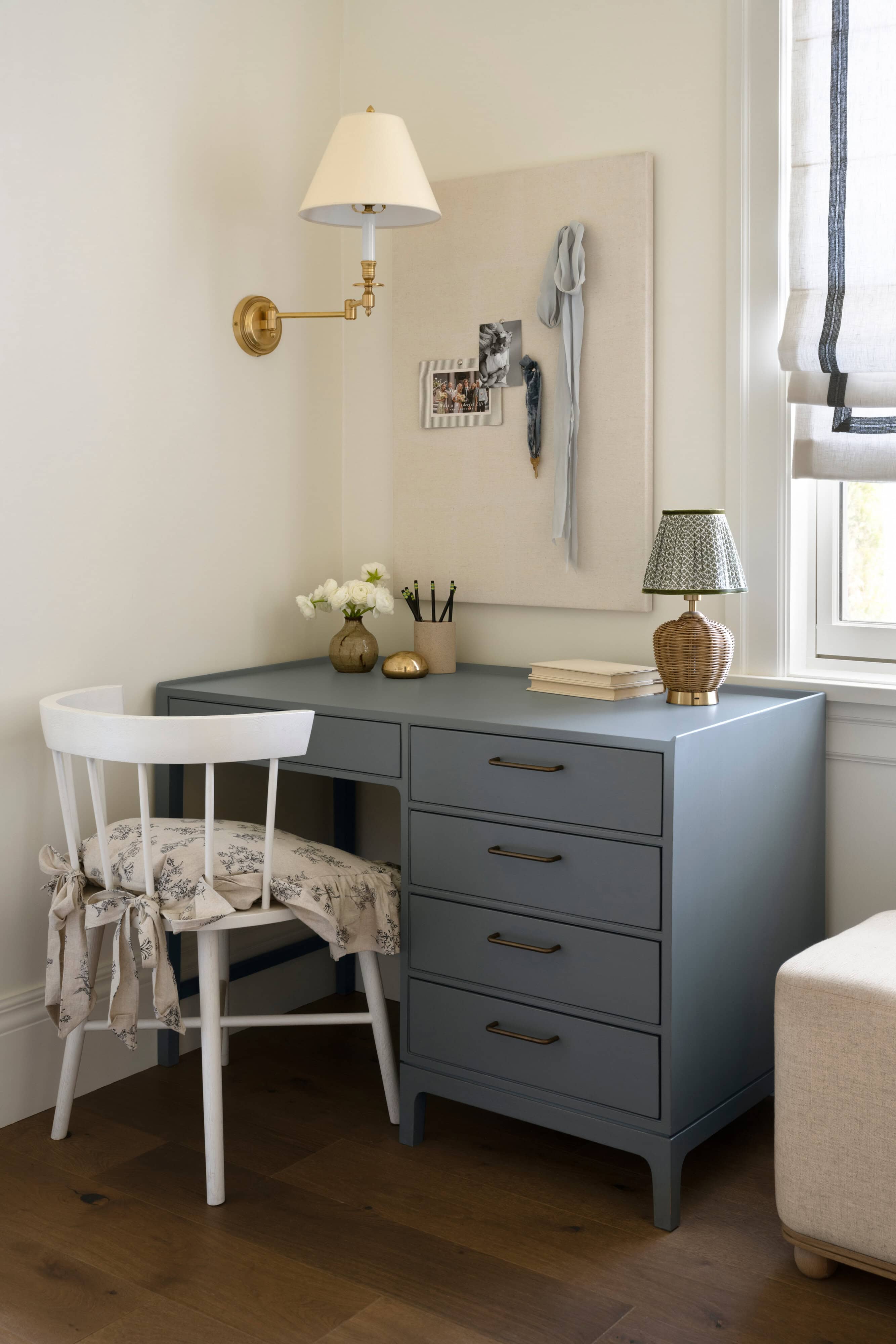 A desk with a chair and a lamp, by McGee & Co.