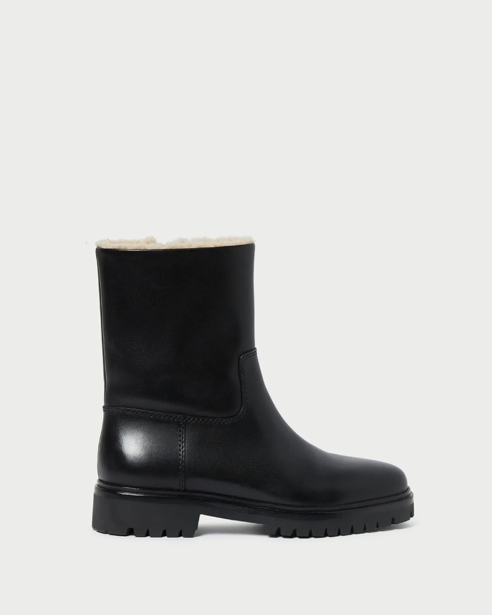 A black mid-calf leather boot with a chunky sole and visible white shearling lining at the top, displayed against a plain white background, by McGee & Co.